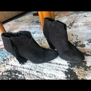 Black booties with fringe